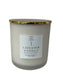 Candle with a gold lid and 'Lavender Vanilla' label on a white background